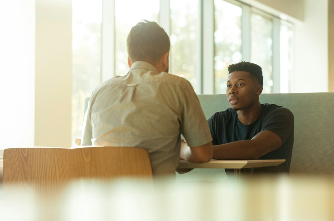 two people having engaging conversation
