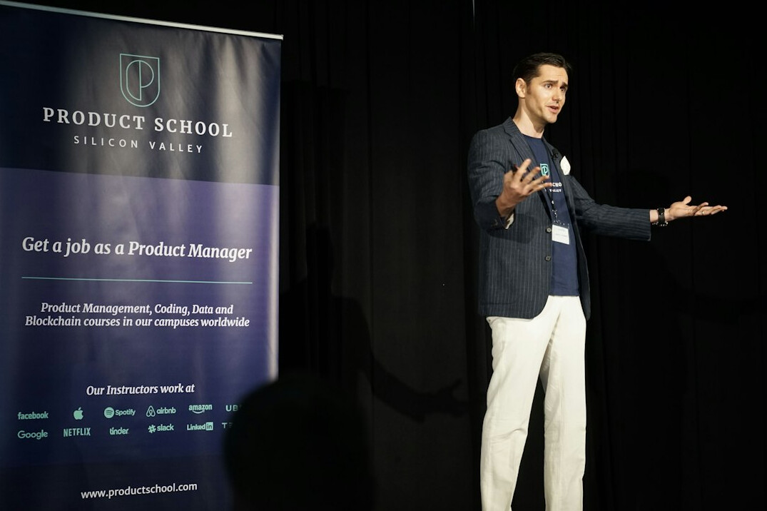 man giving presentation on stage