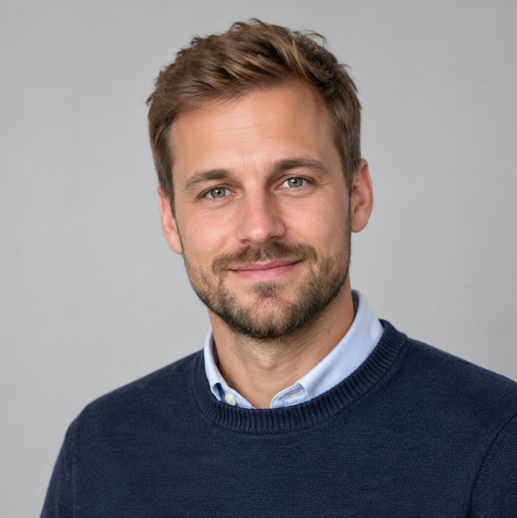 Portrait of a man with a beard looking at the camera